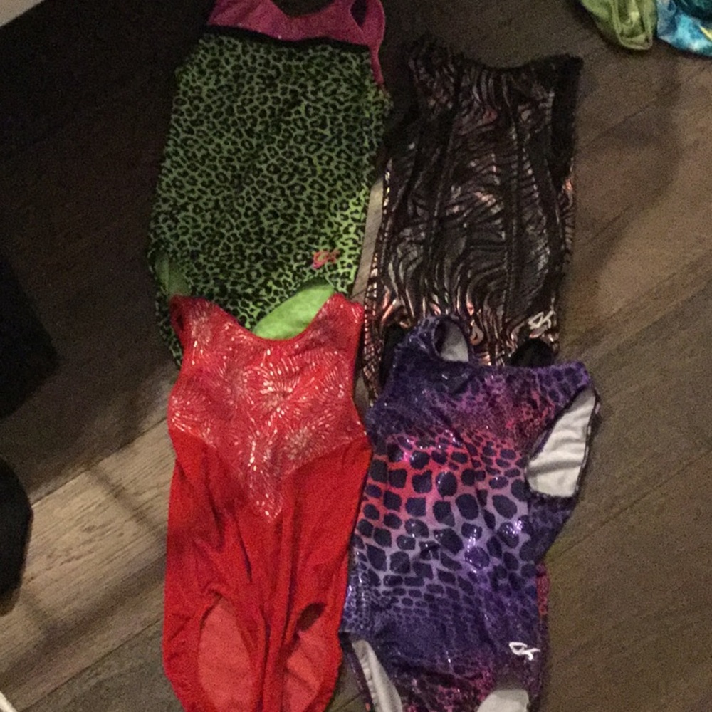 3 GK leotards and the red is unknown brand